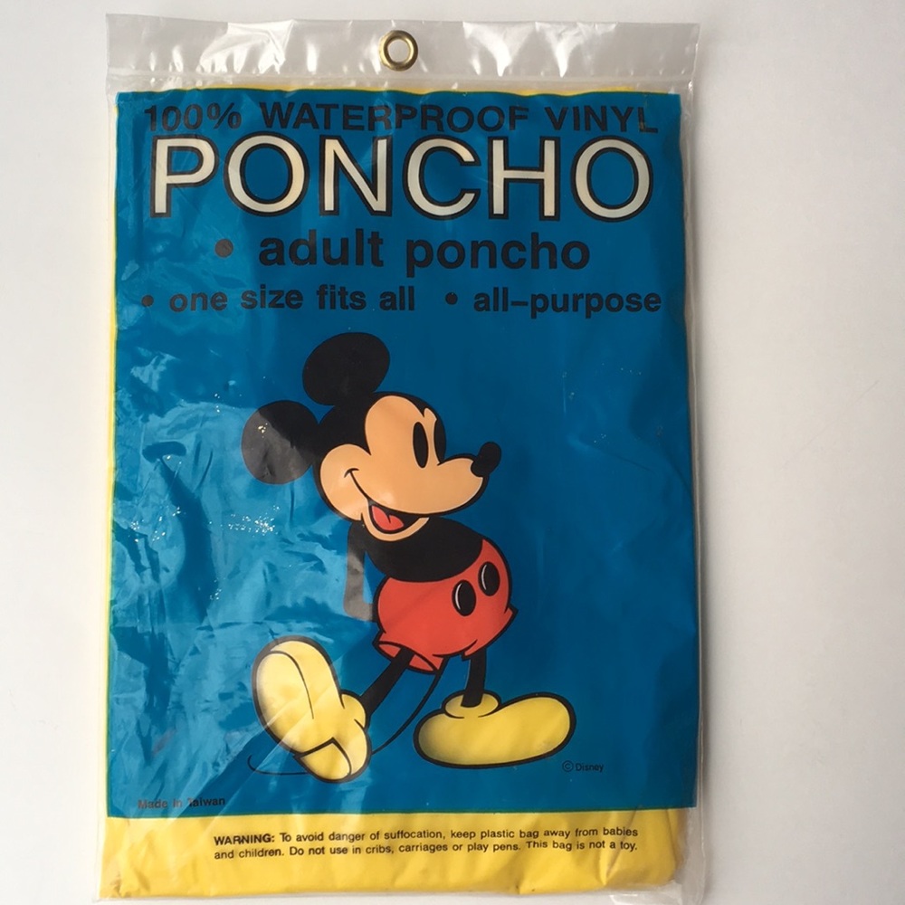 Disney NWT 100% waterproof vinyl adult poncho